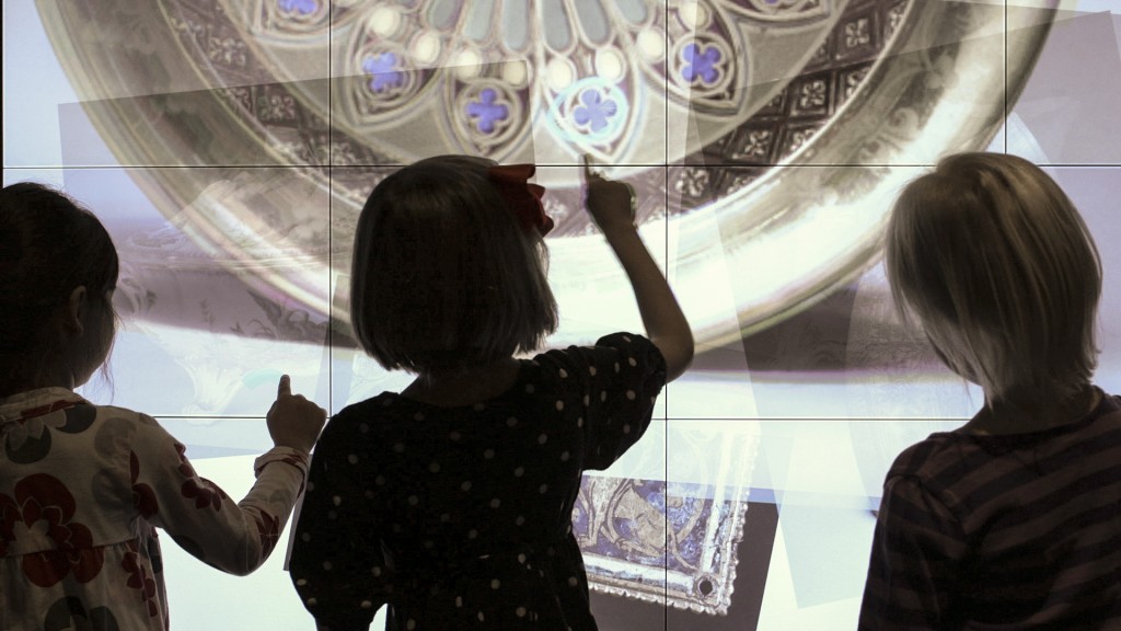 Figure 3: Line and Shape Interactive - Kids search the collection by drawing in Studio Play. Photo courtesy of Local Projects